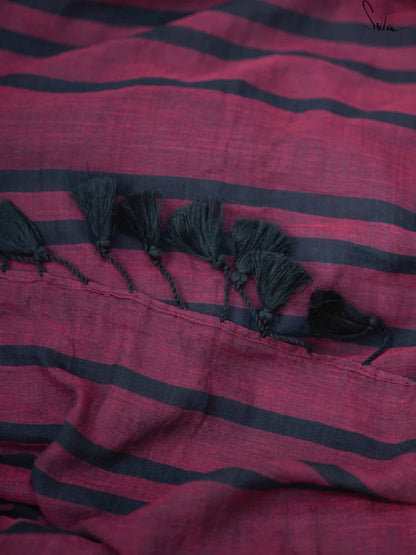 Maroon and black striped fabric with tassels